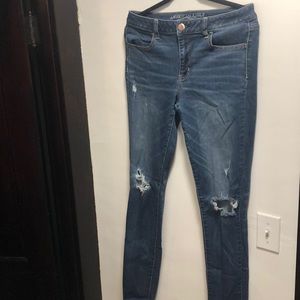 American Eagle ripped blue jeans